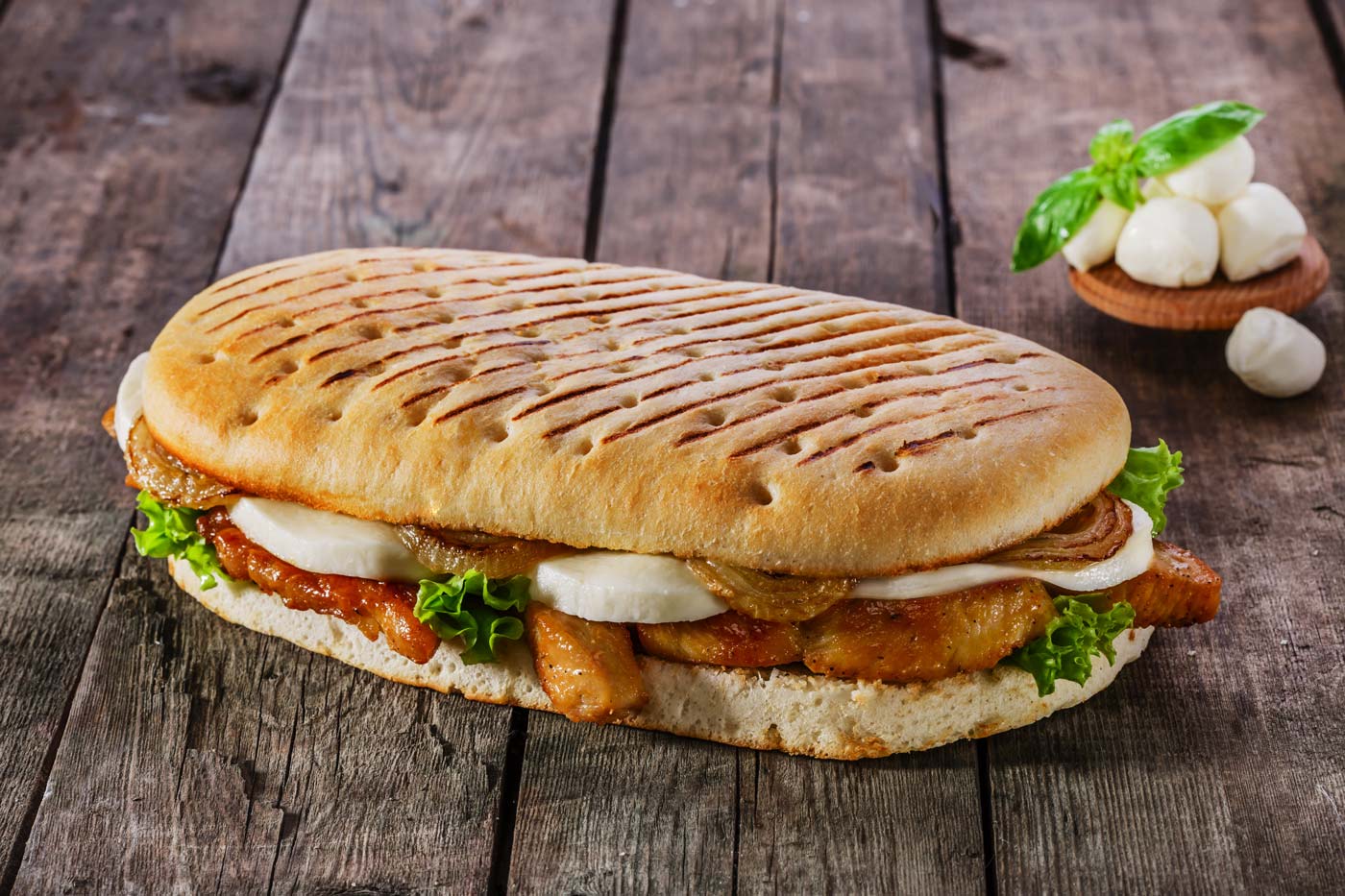 Grilled sandwich with chicken and mozzarella cheese
